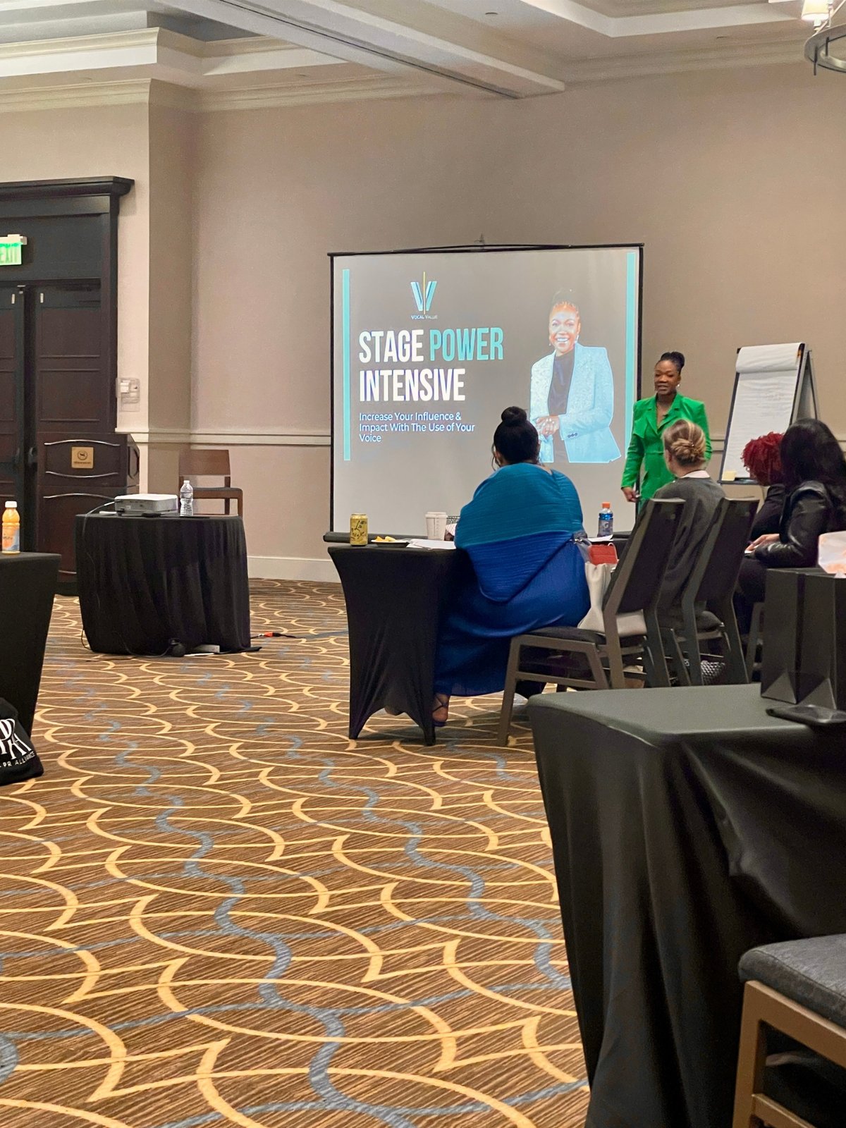 Speaker presenting at the Stage Power Intensive corporate event