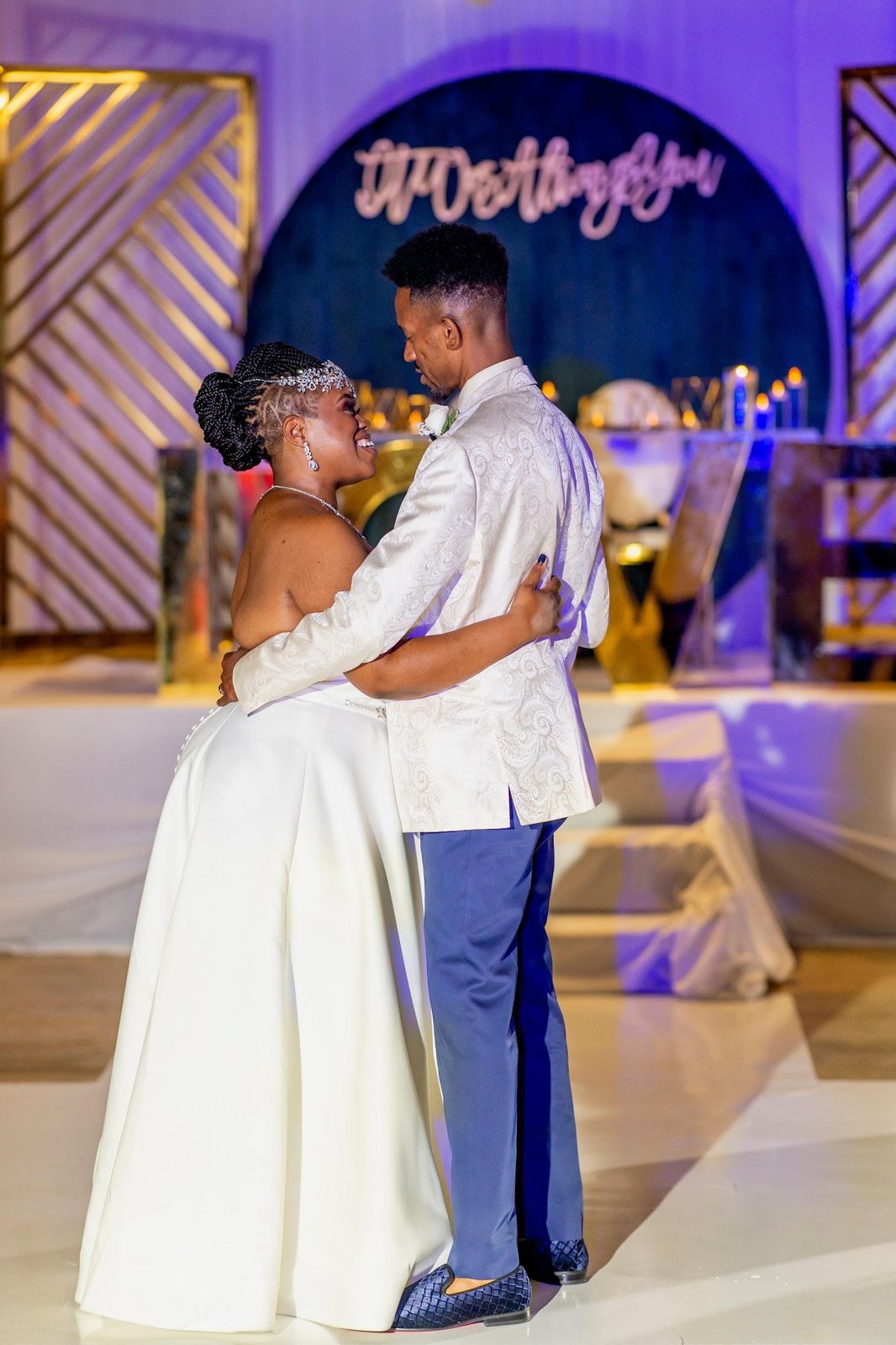 Bride and groom sharing a first dance at a Meraki Occasions coordinated wedding